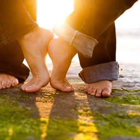 couple-barefoot-on-beach