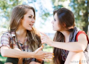 two-young-females-talking-to-each-other